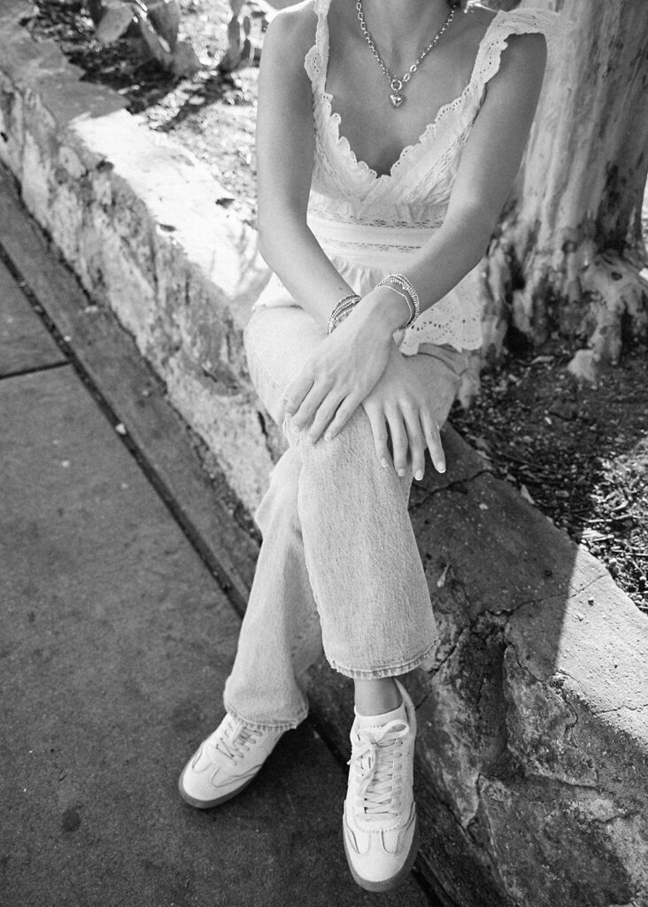 Joyful Austin senior photo on South Congress at golden hour on film