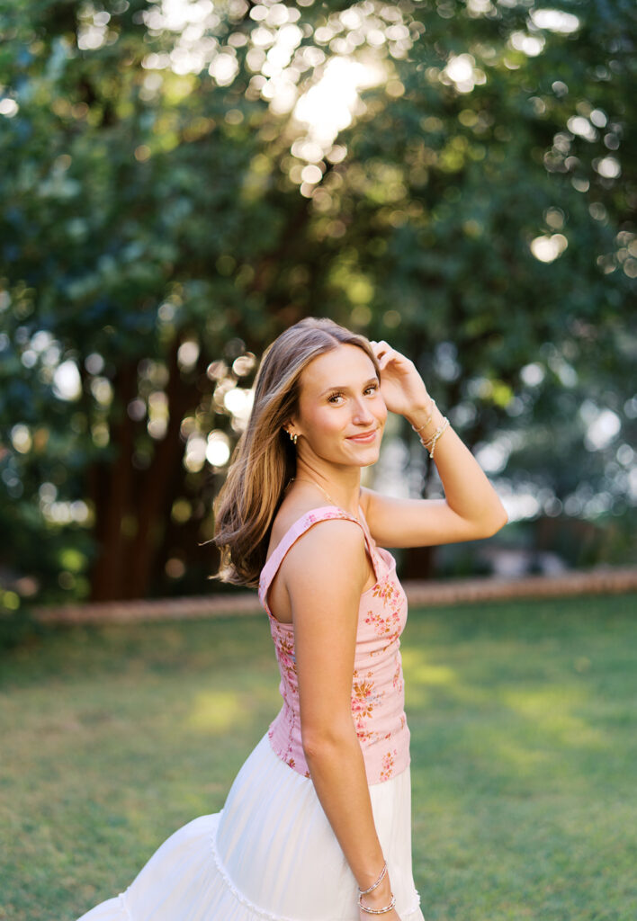 Austin Senior photos at golden hour on film at the four seasons austin