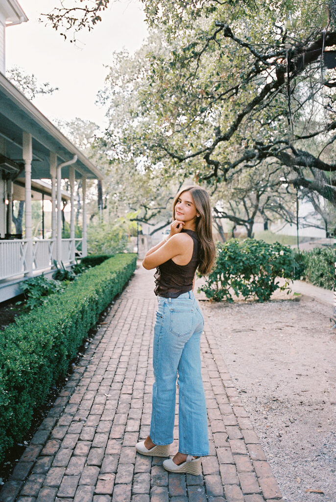 Editorial-inspired Austin senior photo at Mattie’s captured on 35mm film