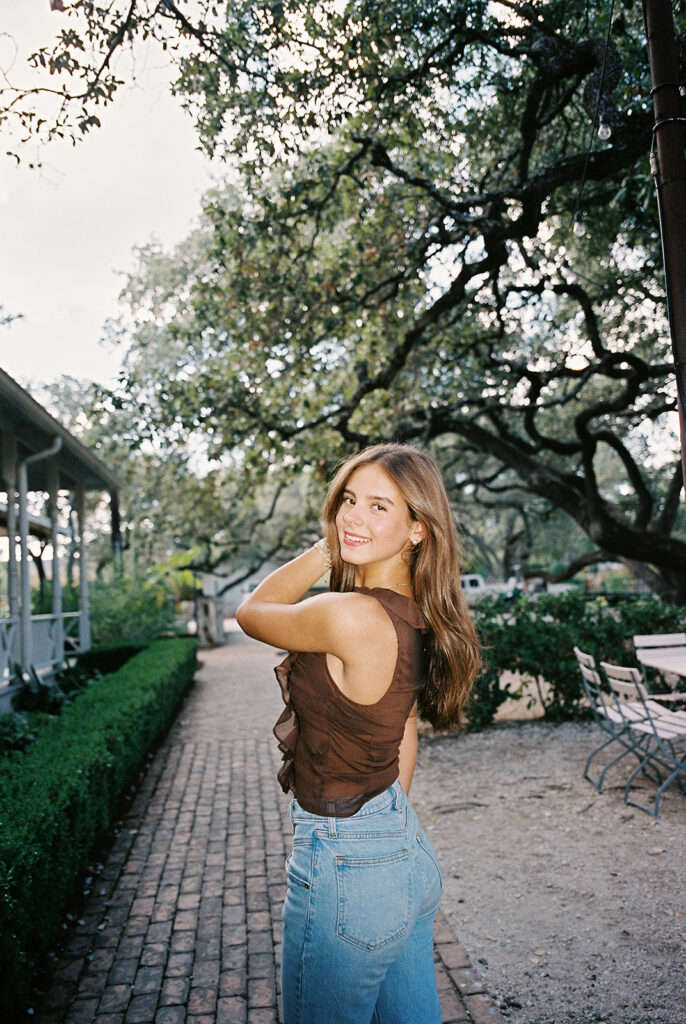 Editorial-inspired Austin senior photo at Mattie’s captured on 35mm film
