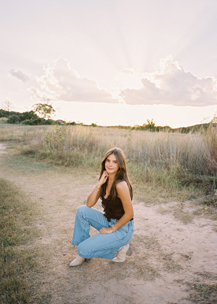 Sunset film portrait of Julep at Commons Ford during her senior photography session in Austin TX