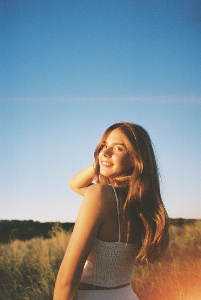 Sunset film portrait of Julep at Commons Ford during her senior photography session in Austin TX