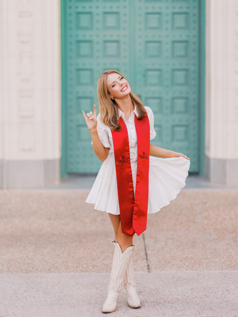 UT Austin senior photos by the green door on campus, modern and colorful graduation portraits full of personality and joy on film