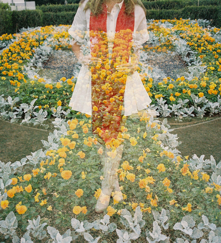 University of Texas grad photos around the UT Austin campus, capturing timeless senior portraits filled with light, laughter, and celebration on film