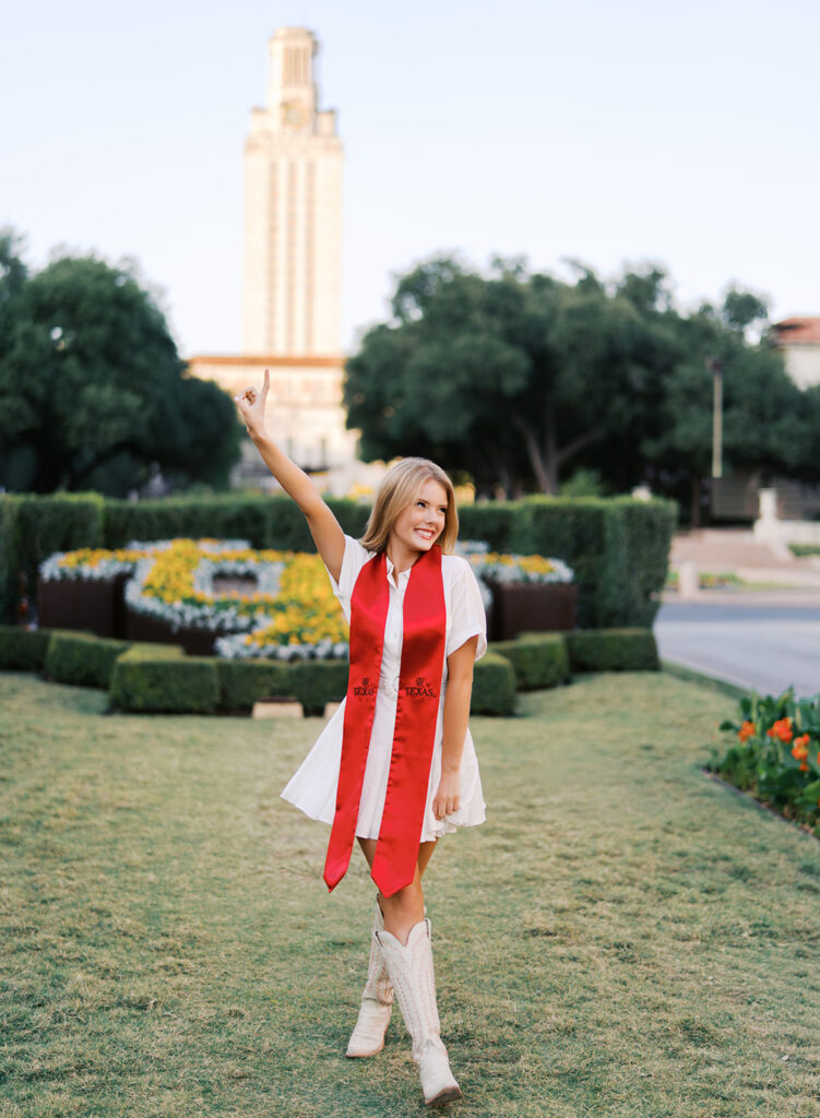 University of Texas senior photos at the UT Tower with cap and gown, timeless graduation portraits by Austin photographer Kelsey Applebaum on film