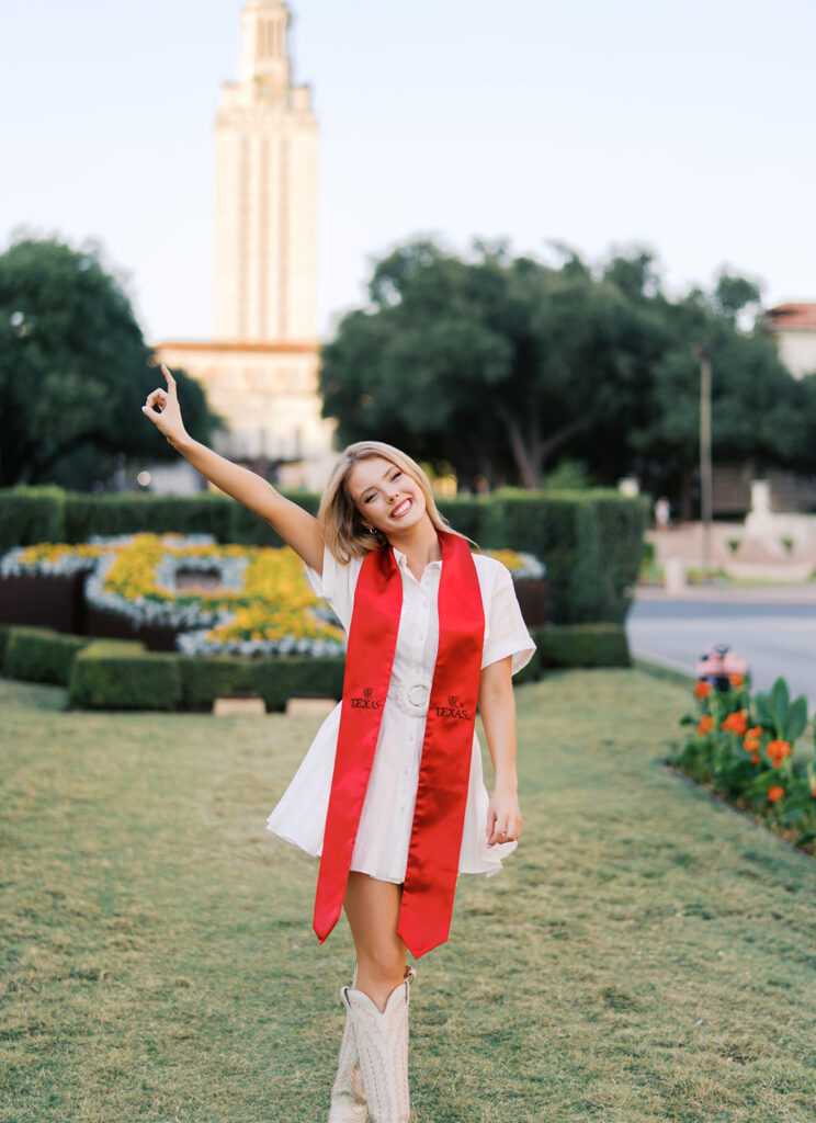 University of Texas senior photos at the UT Tower with cap and gown, timeless graduation portraits by Austin photographer Kelsey Applebaum on film