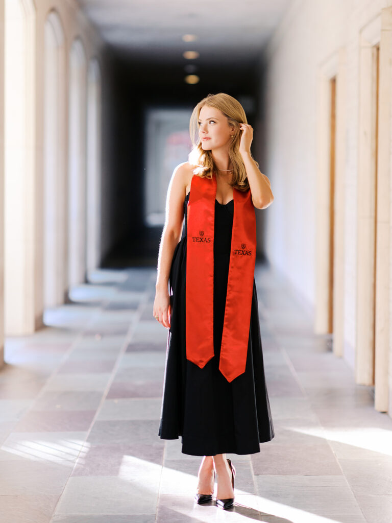 University of Texas grad photos around the UT Austin campus, capturing timeless senior portraits filled with light, laughter, and celebration on film