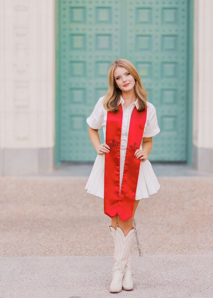 UT Austin senior photos by the green door on campus, modern and colorful graduation portraits full of personality and joy on film