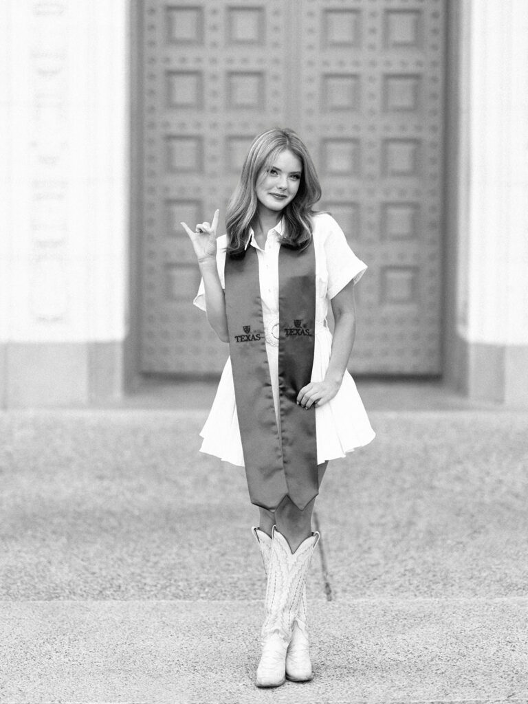 UT Austin senior photos by the green door on campus, modern and colorful graduation portraits full of personality and joy on film