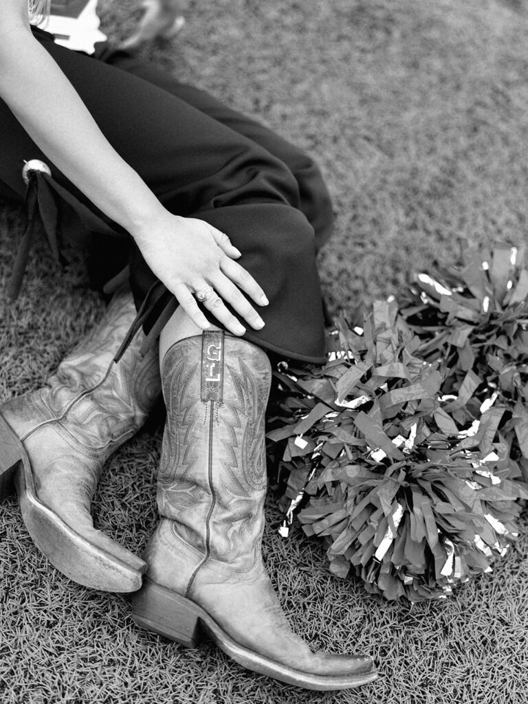 University of Texas senior in Texas Pom uniform during DKR stadium graduation session on film