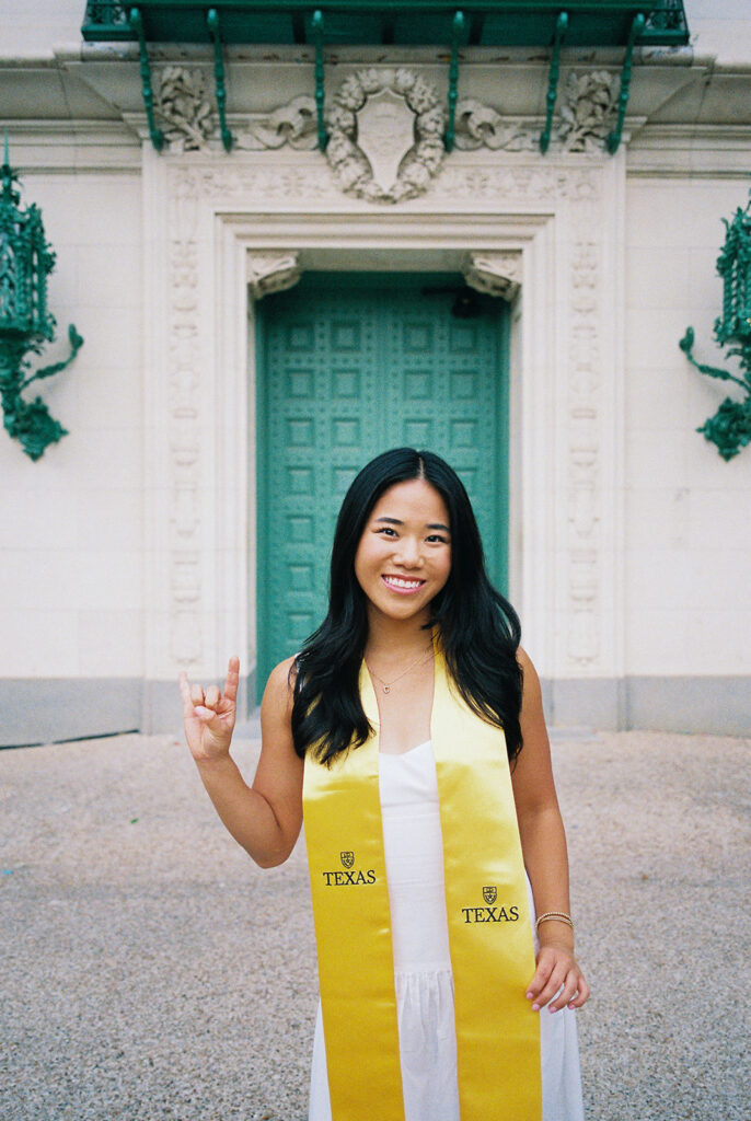 Texas Longhorn senior photos in front of the UT Tower at sunset on film