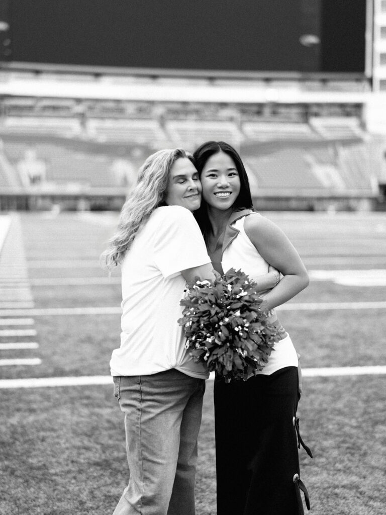 University of Texas senior in Texas Pom uniform during DKR stadium graduation session