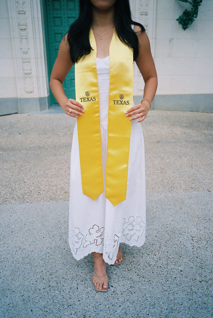 Texas Longhorn senior photos in front of the UT Tower at sunset on film