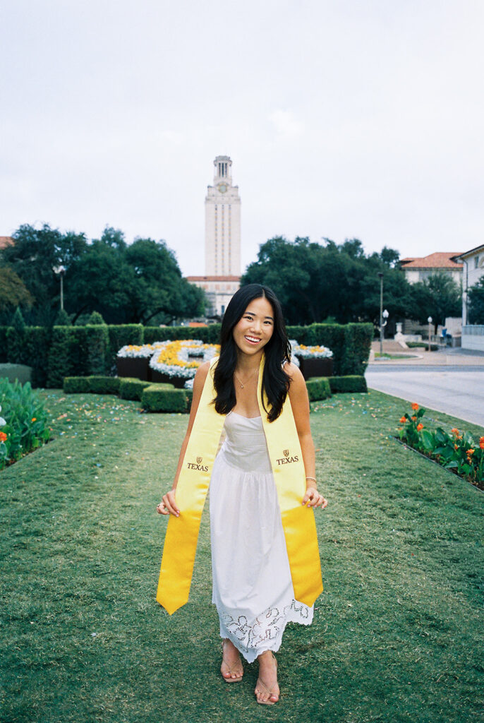 Texas Longhorn senior photos in front of the UT Tower at sunset on film