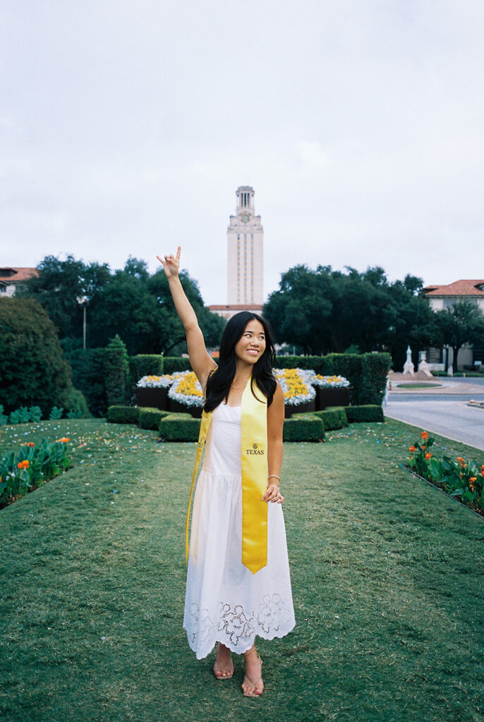 Texas Longhorn senior photos in front of the UT Tower at sunset on film
