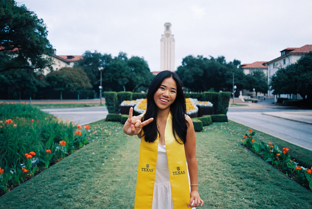 Texas Longhorn senior photos in front of the UT Tower at sunset on film