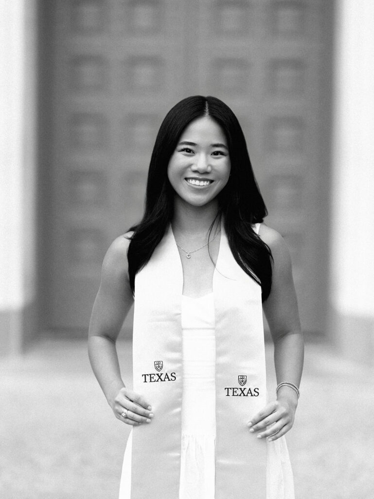Texas Longhorn senior photos in front of the UT Tower at sunset