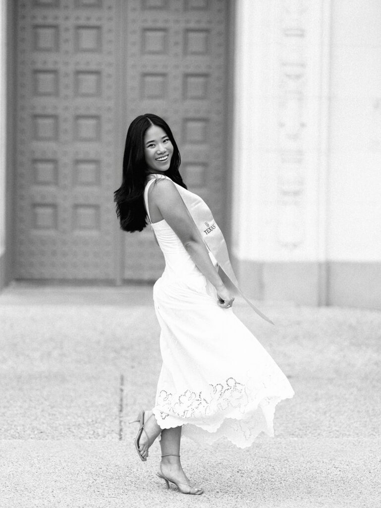 Texas Longhorn senior photos in front of the UT Tower at sunset