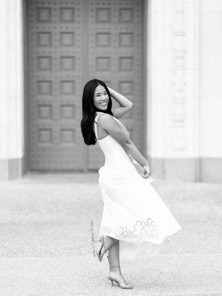 Texas Longhorn senior photos in front of the UT Tower at sunset