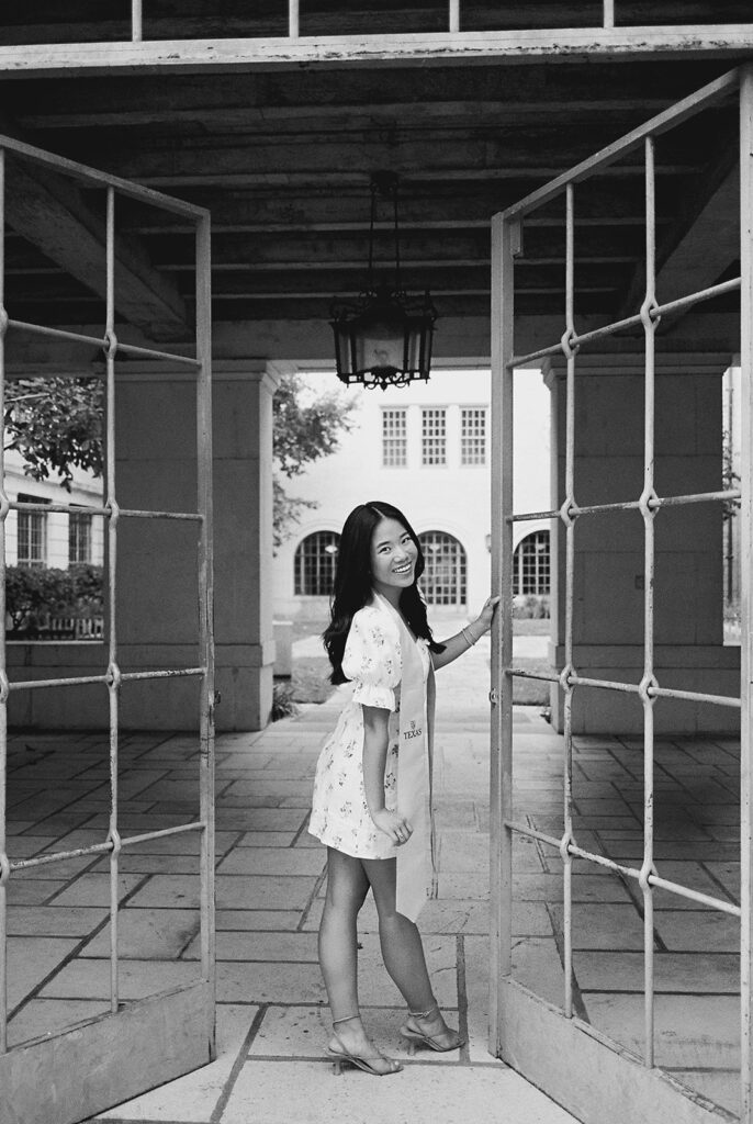 Texas Longhorn senior photos in front of the UT Tower at sunset on film