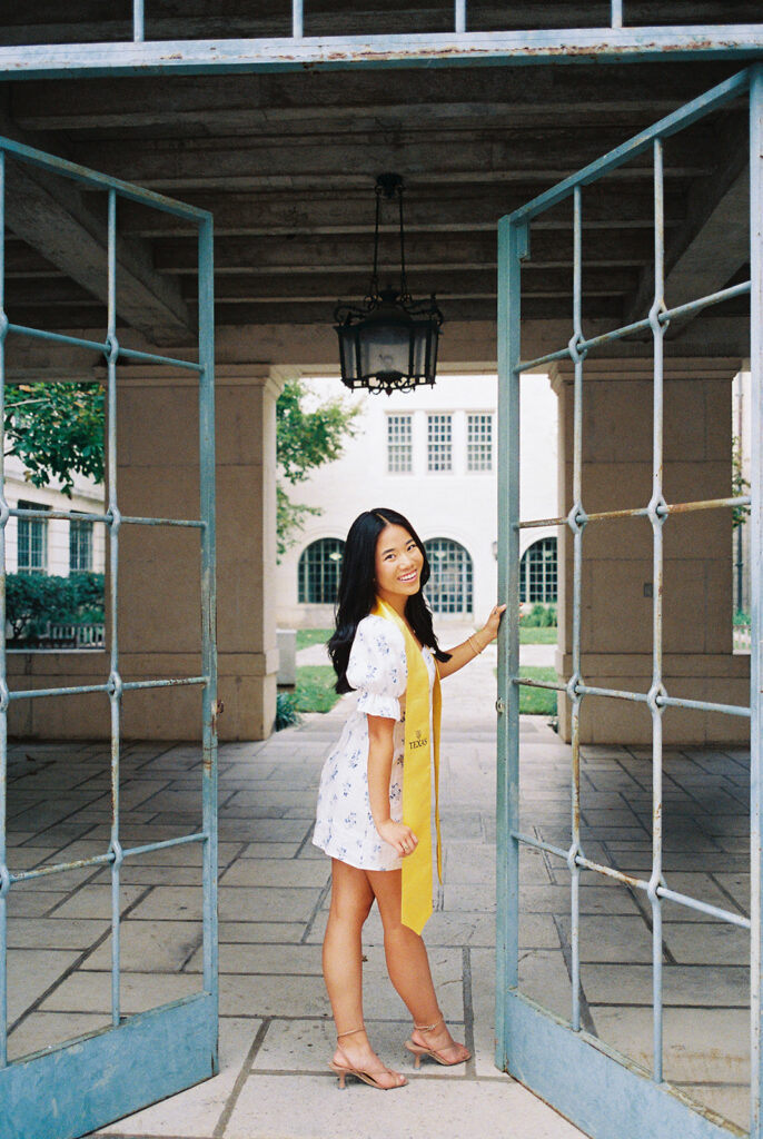 Texas Longhorn senior photos in front of the UT Tower at sunset on film