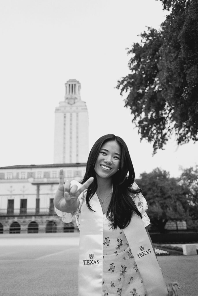 Texas Longhorn senior photos in front of the UT Tower at sunset on film