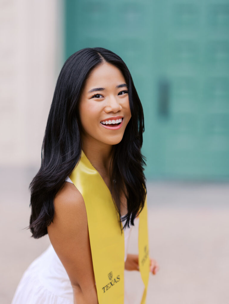 Texas Longhorn senior photos in front of the UT Tower at sunset on film