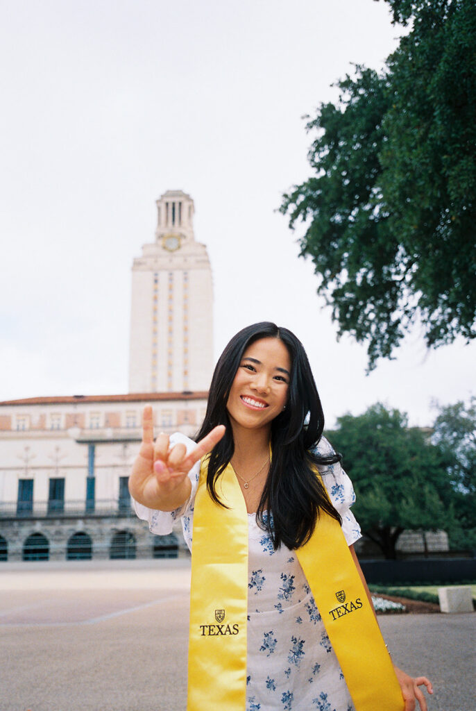 Texas Longhorn senior photos in front of the UT Tower at sunset on film