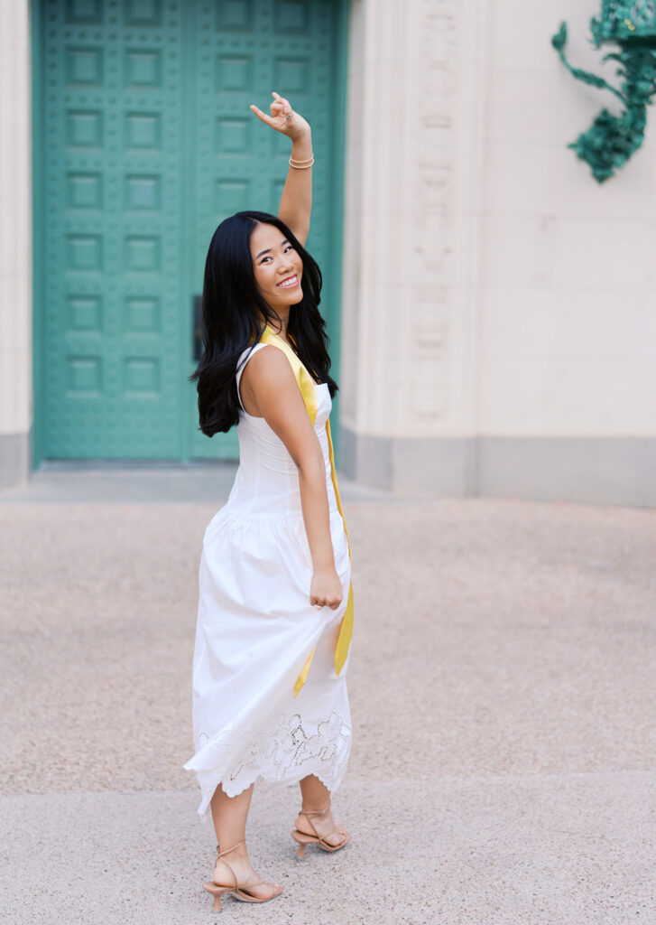 Texas Longhorn senior photos in front of the UT Tower at sunset on film