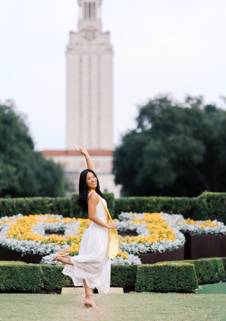 Texas Longhorn senior photos in front of the UT Tower at sunset on film