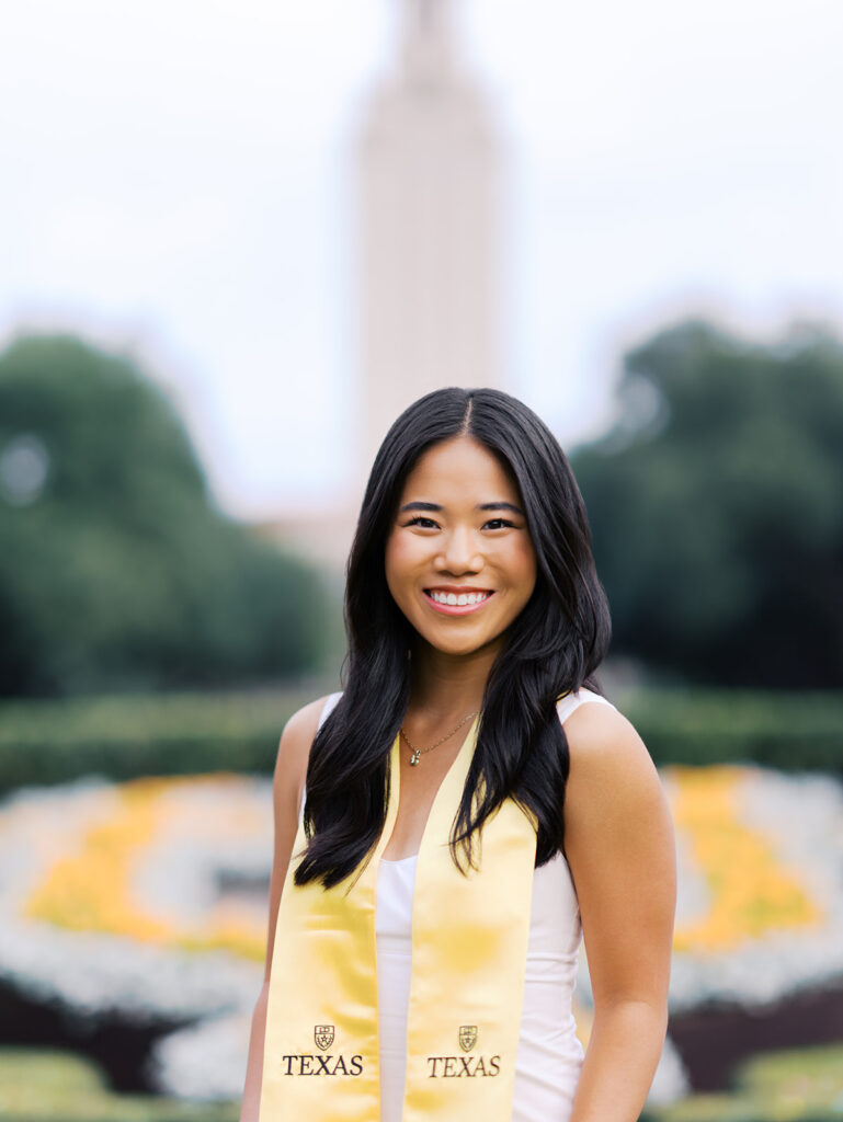 Texas Longhorn senior photos in front of the UT Tower at sunset on film