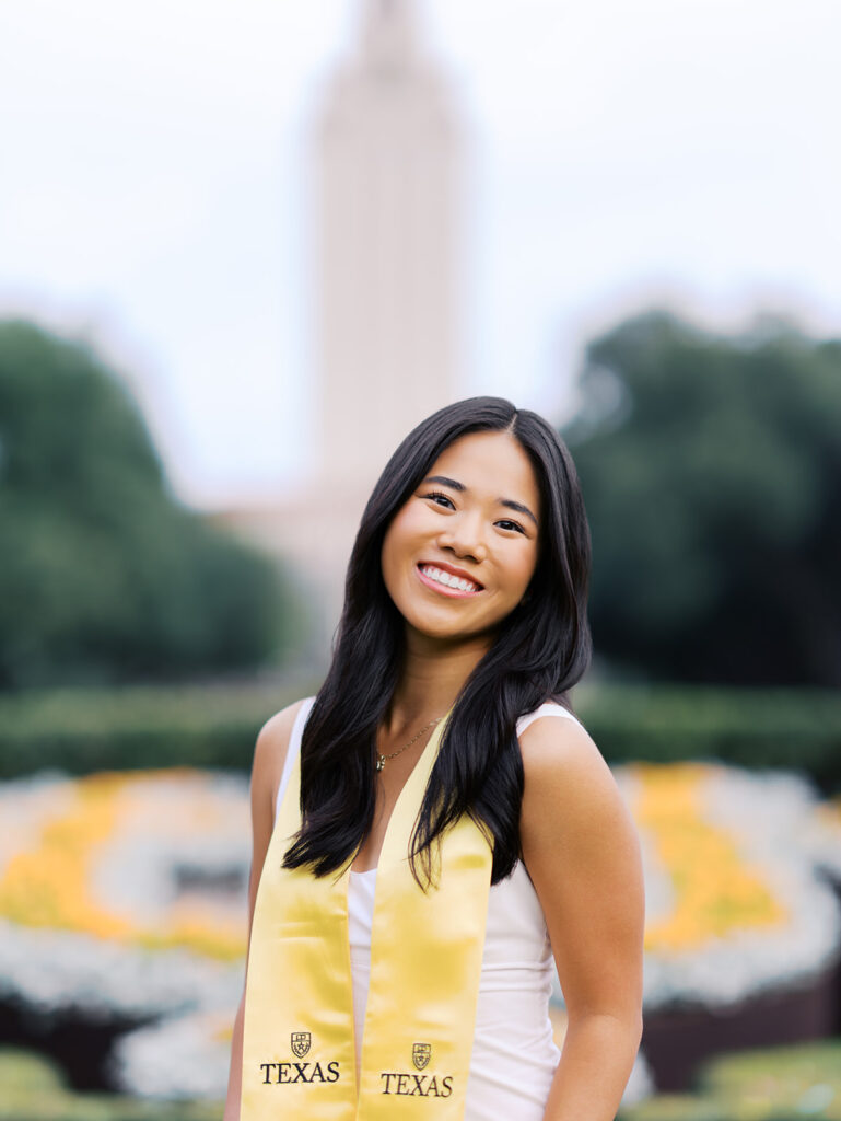 Texas Longhorn senior photos in front of the UT Tower at sunset on film