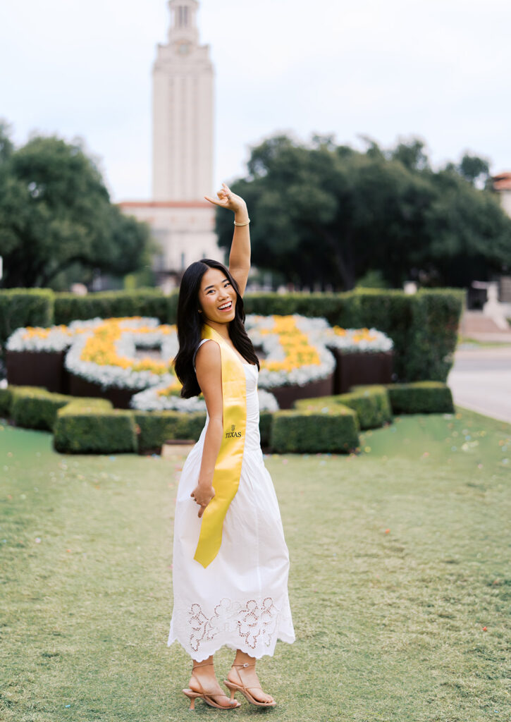 Texas Longhorn senior photos in front of the UT Tower at sunset on film