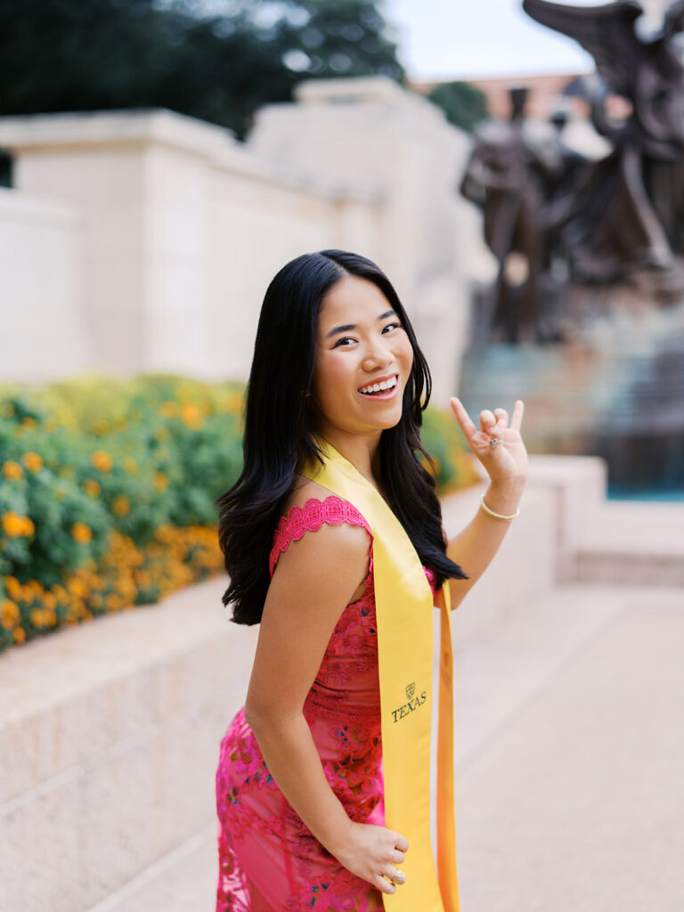 University of Texas graduation photos around campus landmarks
