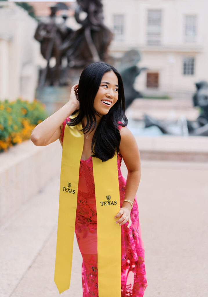 University of Texas graduation photos around campus landmarks