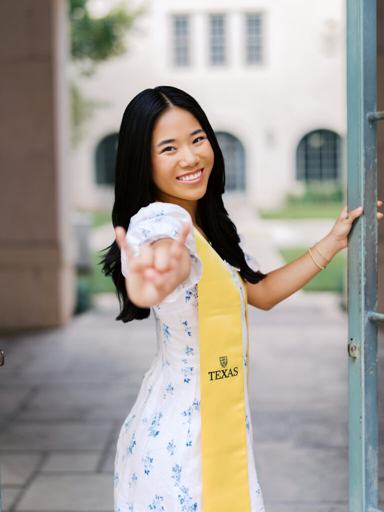 University of Texas graduation photos around campus landmarks