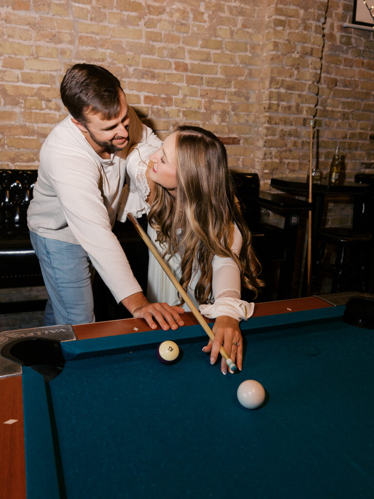 Fun and candid dive bar engagement session photographed on film