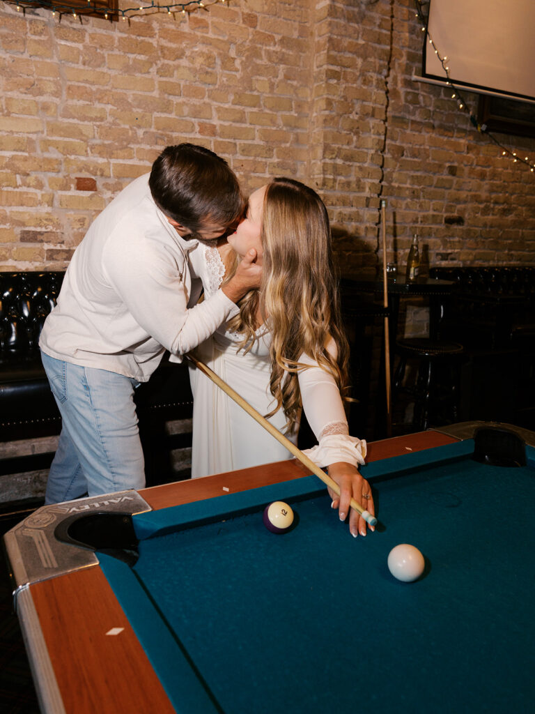 Fun and candid dive bar engagement session photographed on film