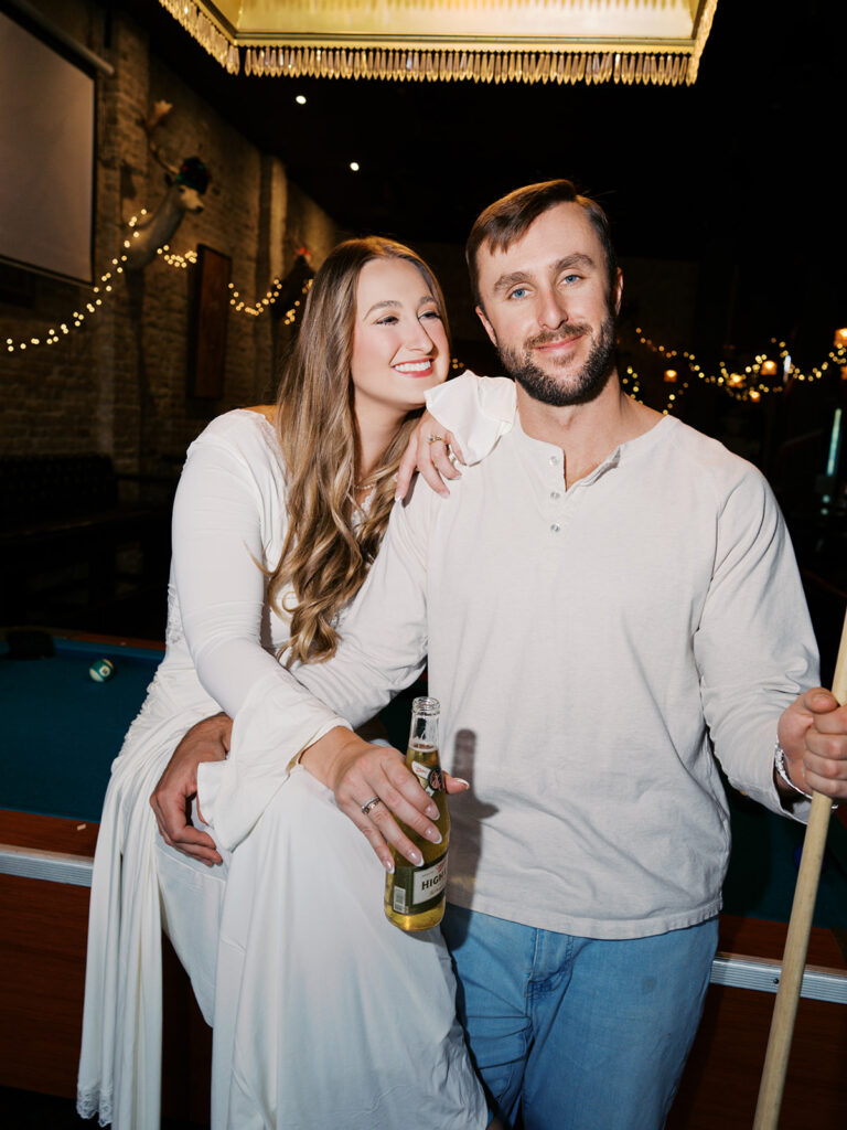 Fun and candid dive bar engagement session photographed on film