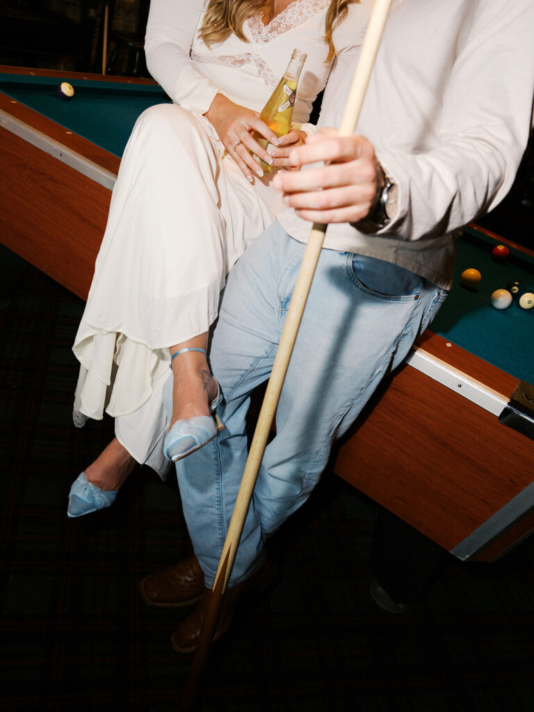 Fun and candid dive bar engagement session photographed on film