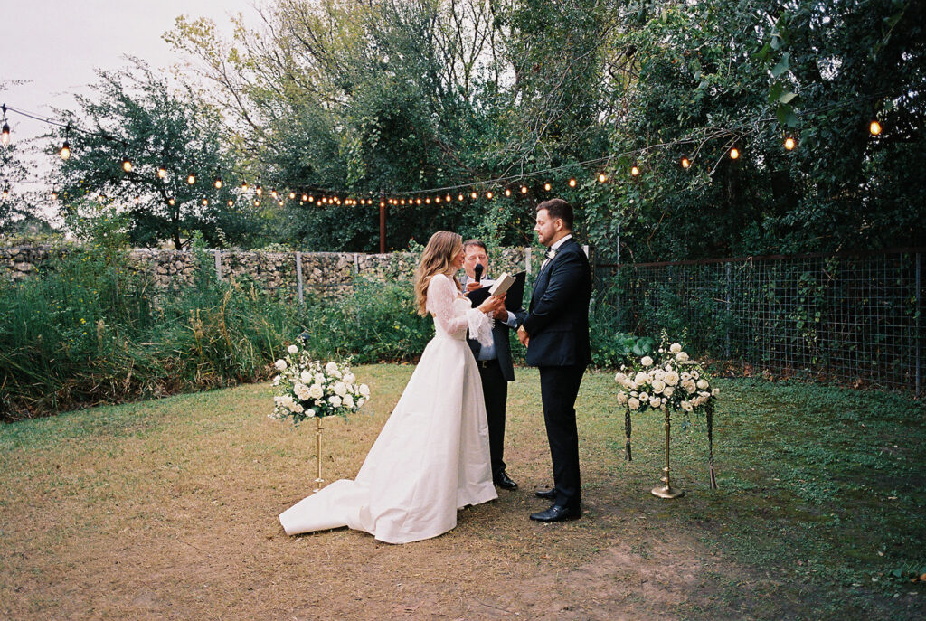 Outdoor wedding ceremony at Springdale Station on a November day on film