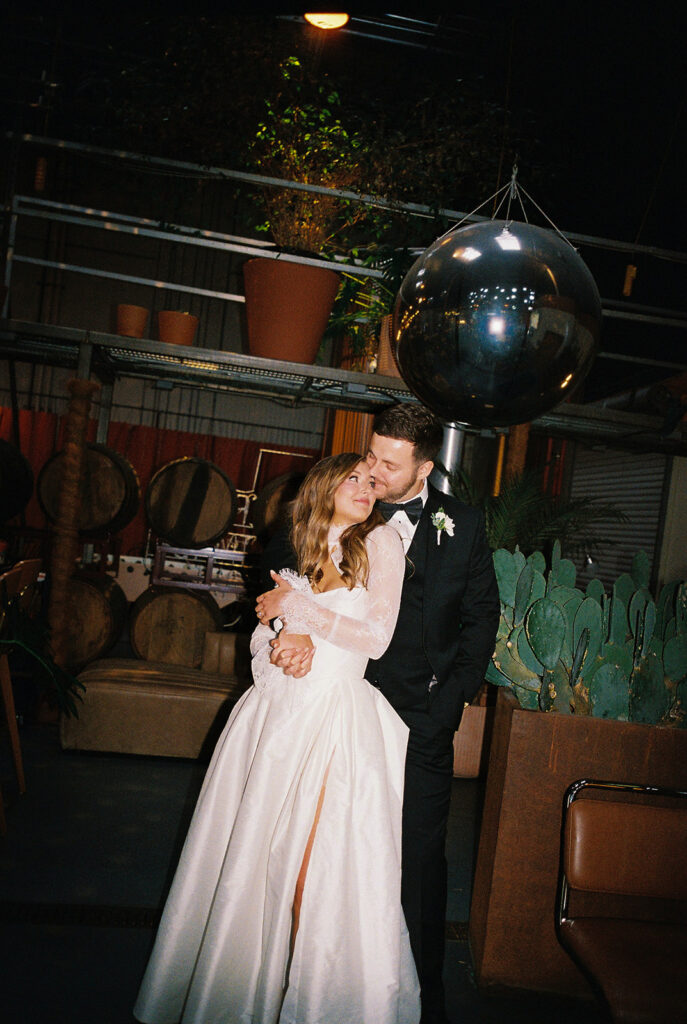Bride and groom portrait with flash film photography at Springdale Station wedding venue