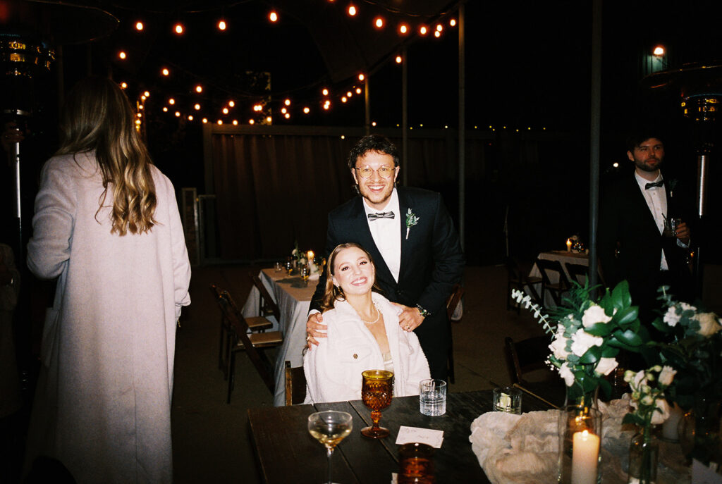 Joyful wedding reception with dancing at Springdale Station on film