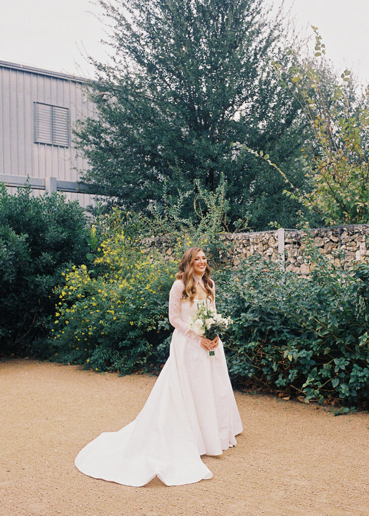 Bride and bridesmaids portrait outdoors at Springdale Station wedding venue