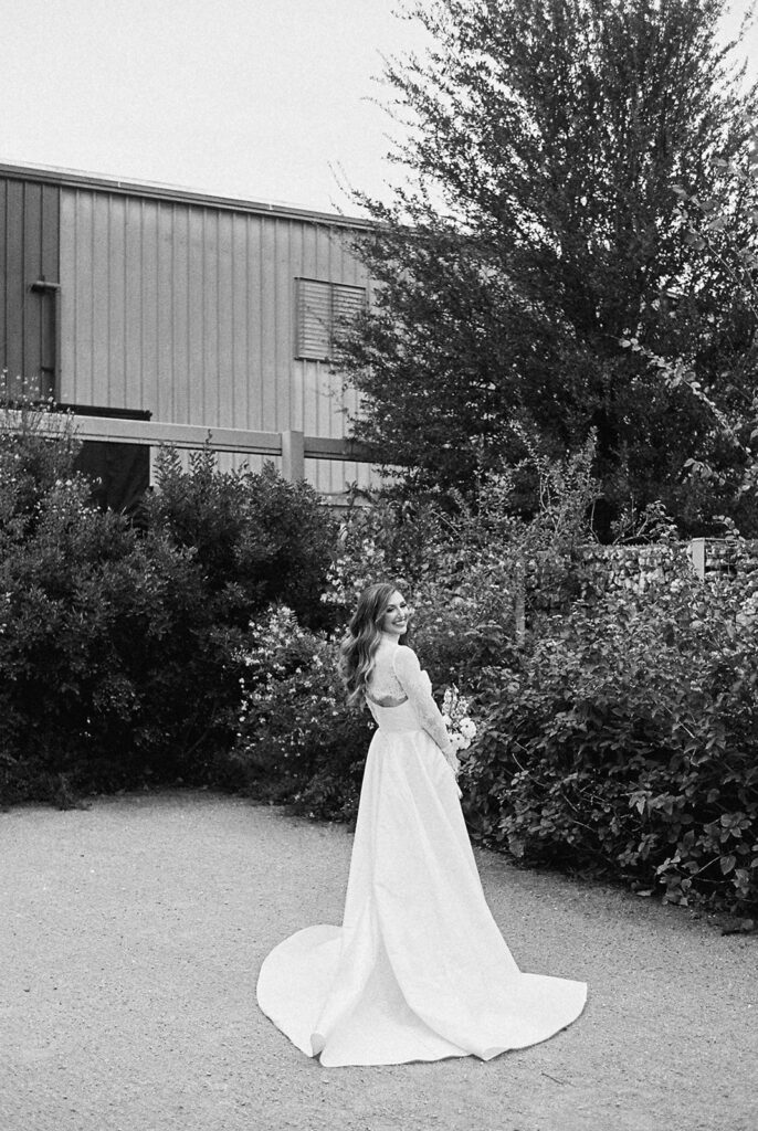 Bride and bridesmaids portrait outdoors at Springdale Station wedding venue