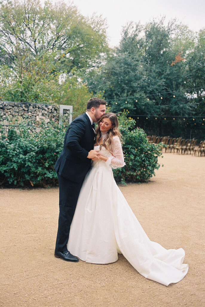 Emotional first look during an intimate wedding in Austin, Texas photographed on film