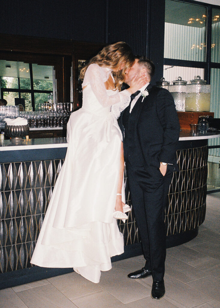 Bride and groom portrait with flash film photography at Springdale Station wedding venue