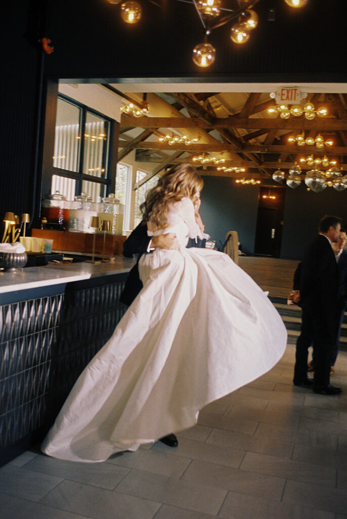 Bride and groom portrait with flash film photography at Springdale Station wedding venue
