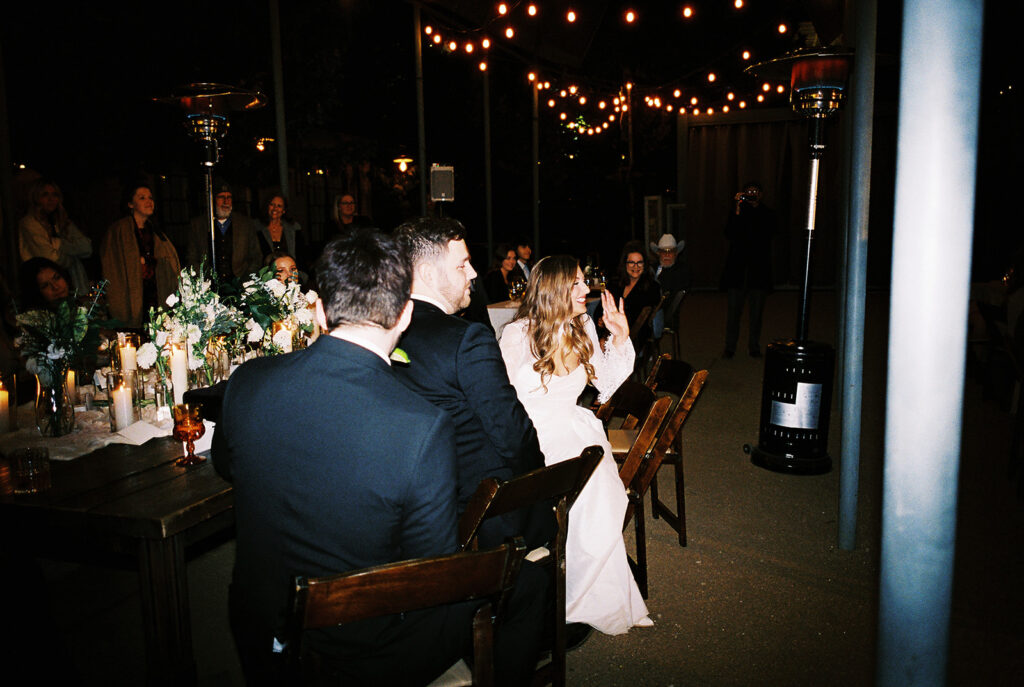 Joyful wedding reception with dancing at Springdale Station on film