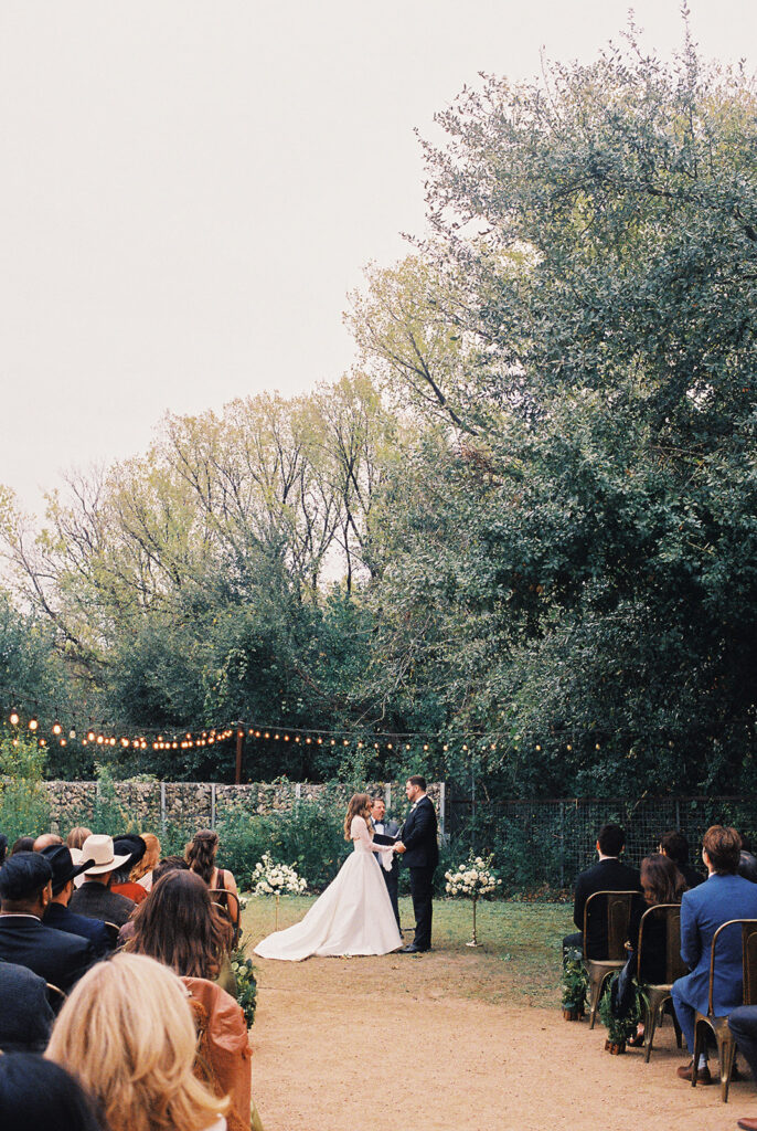 Outdoor wedding ceremony at Springdale Station on a November day on film